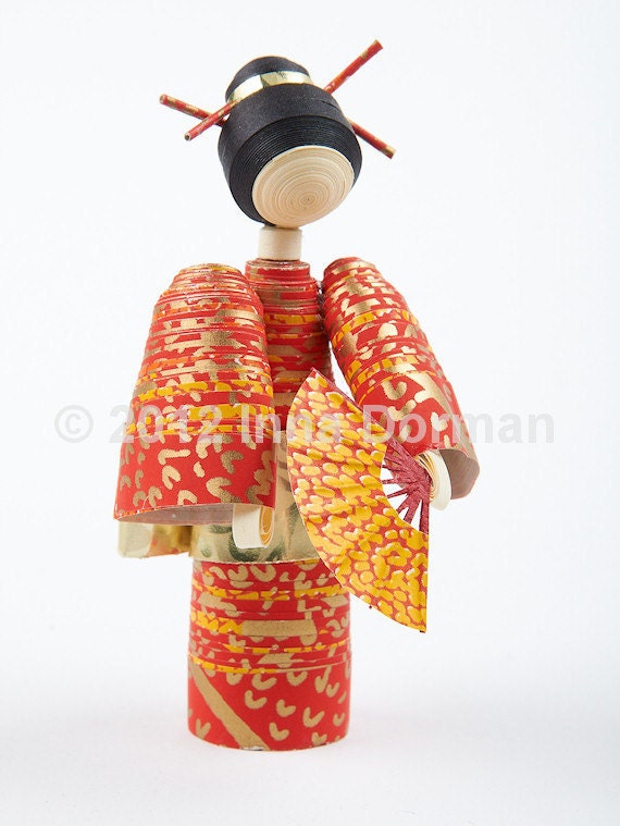 Japanese doll with a fan. Collectible, one of a kind