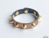 Shiny bronze leather spiked bracelet
