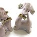 Vintage Salt and Pepper Shakers Cat and Dog Pink with gold accents