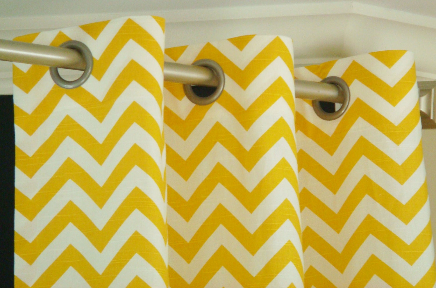 Pair of Grommet Top Curtains in Yellow and White Zig Zag Chevron print