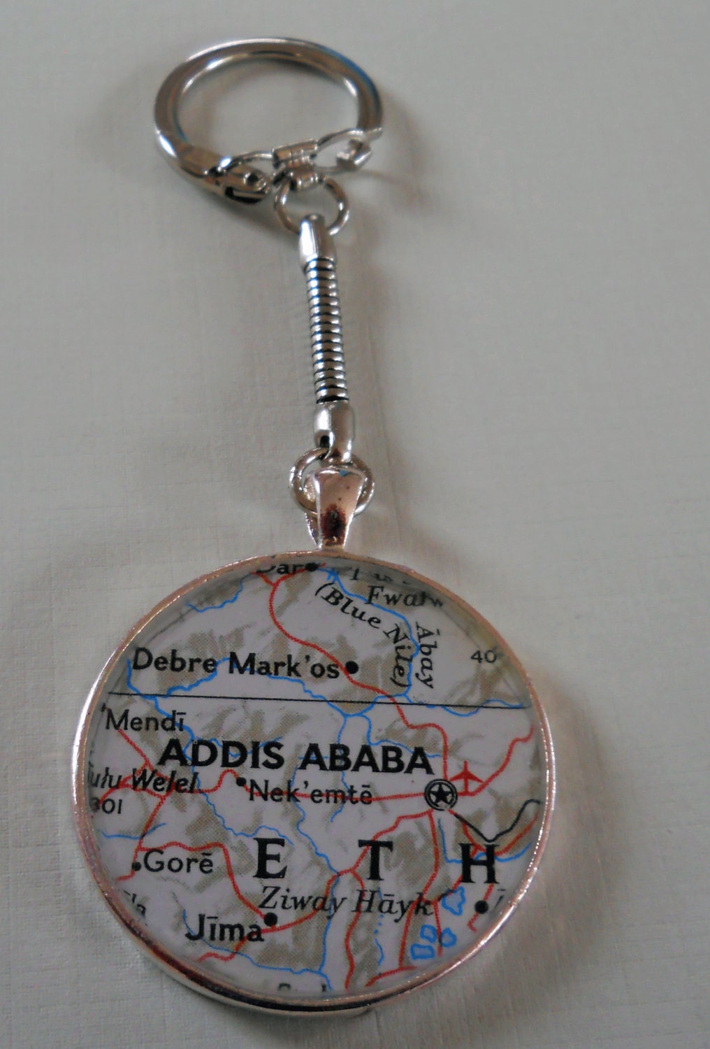 ANYWHERE IN WORLD Keychain with 1.5" Pendant Resin Map