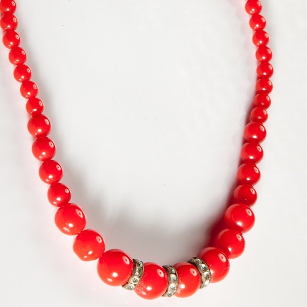 Striking 1960s red beaded necklace with rhinestones.