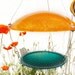 Eco-Friendly Bird Feeder. repurposed materials Birdfeeder aqua blue green yellow