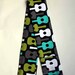 DSLR Camera Strap Cover- lens cap pocket and padding included- Groovy Guitar