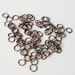Antique Copper Jump Rings 8mm 1/2 oz. Approx 200 pieces