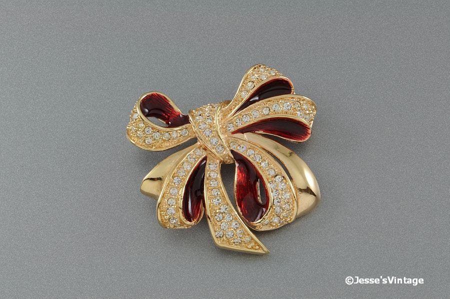 Rhinestone Ribbon Brooch w Red Enamel Accent Signed