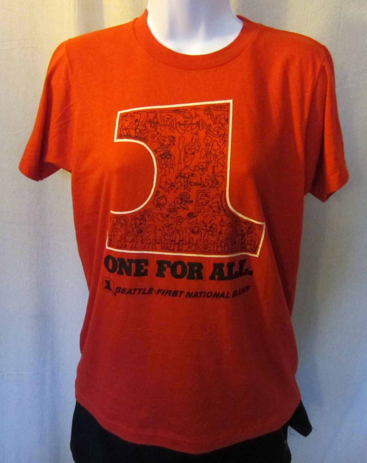 Vintage Super Soft 70s  SEATTLE NATIONAL BANK One For All Cute Graphic Women Small Medium 50/50 T-Shirt