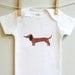 Dachshund baby onesie, baby boy or baby girl. Short or long sleeve. Your choice of size.