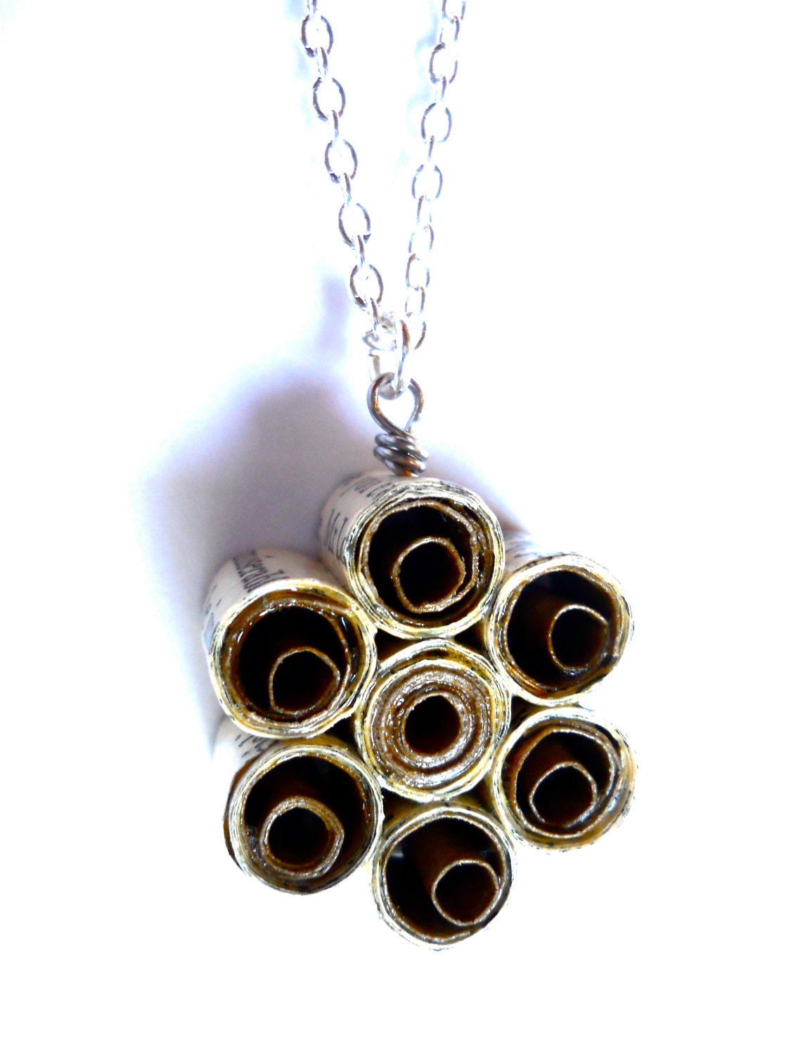 Book page pendant made from recycled books