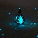 Mermaids Magic Ocean Blue - Caged Pendant with Glowing Essence of the Sea - Amazing Glow in the Dark Effects