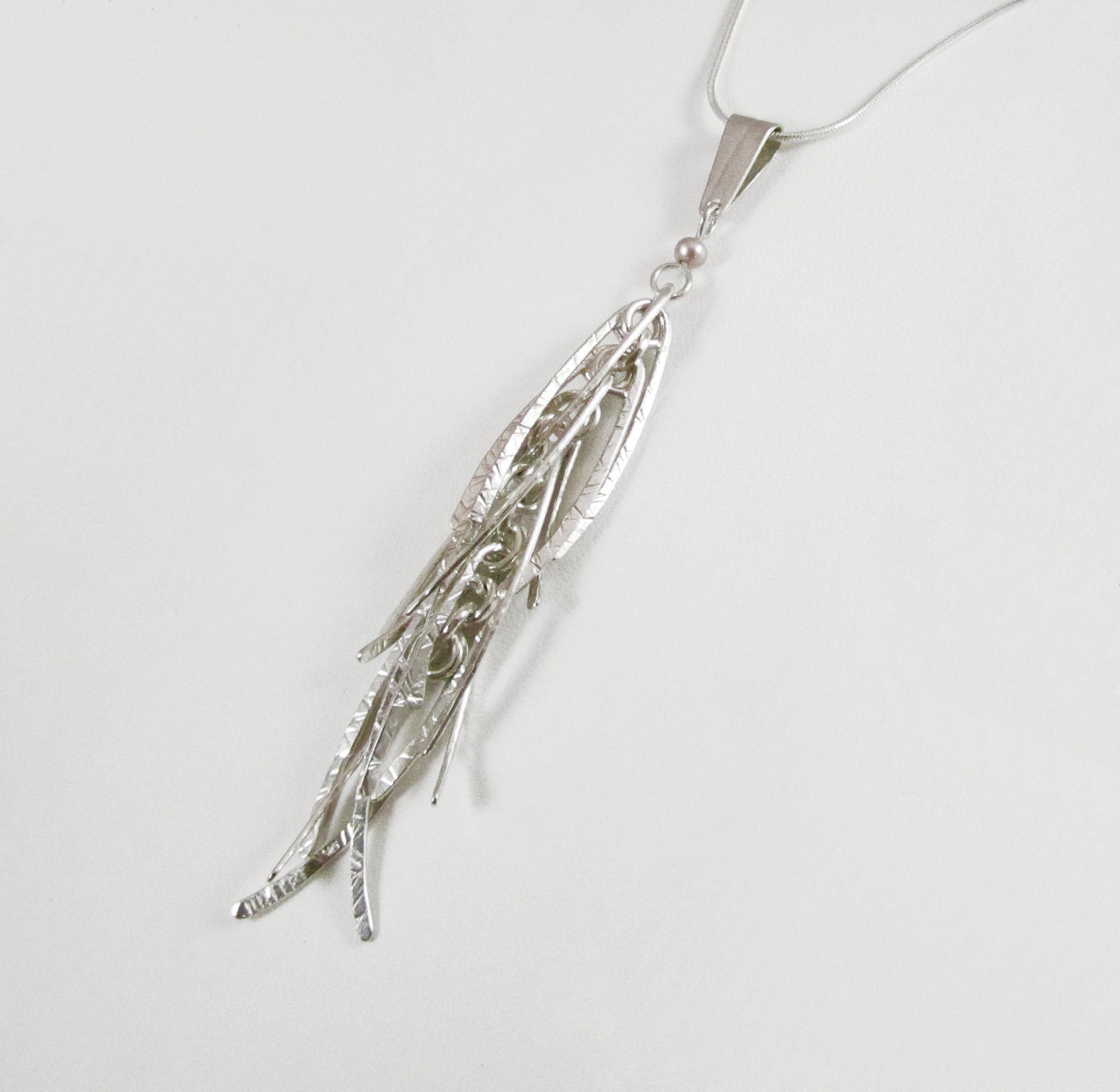 Sterling silver hammered wire pendant