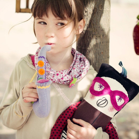 Whimsical Funny Boy Toy with a saxophone and pink glasses/ Children toy