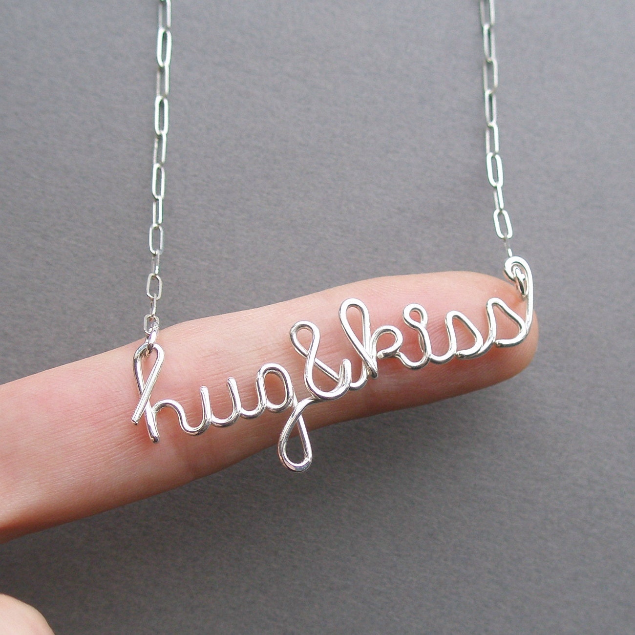 hug and kiss necklace - sterling silver wire word