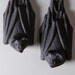 Pair of stoneware pottery bats