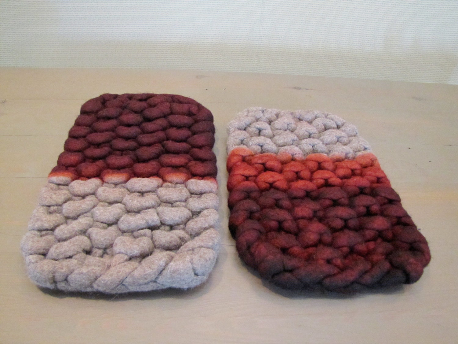 Extra chunky thick wool felt hand knit roving dip dyed trivet in natural gray and dark red