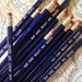 We are what we make pencil 6 pack in metallic blue. Made in USA.