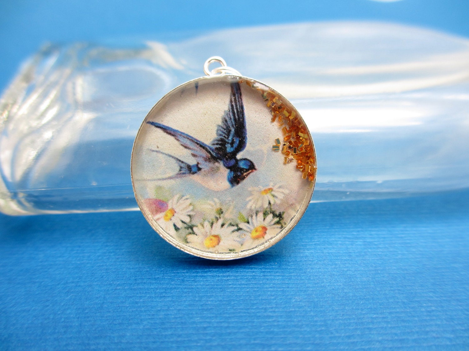 Blue Bird. Vintage bird and daisies one of kind collage set in sterling silver pendant