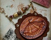 Spectacle - leather & fiber carnival necklace
