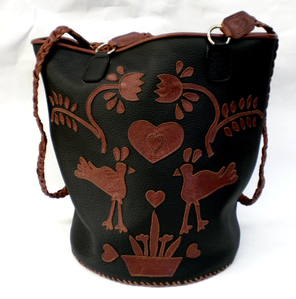 Large tan and black basket bag with folk applique