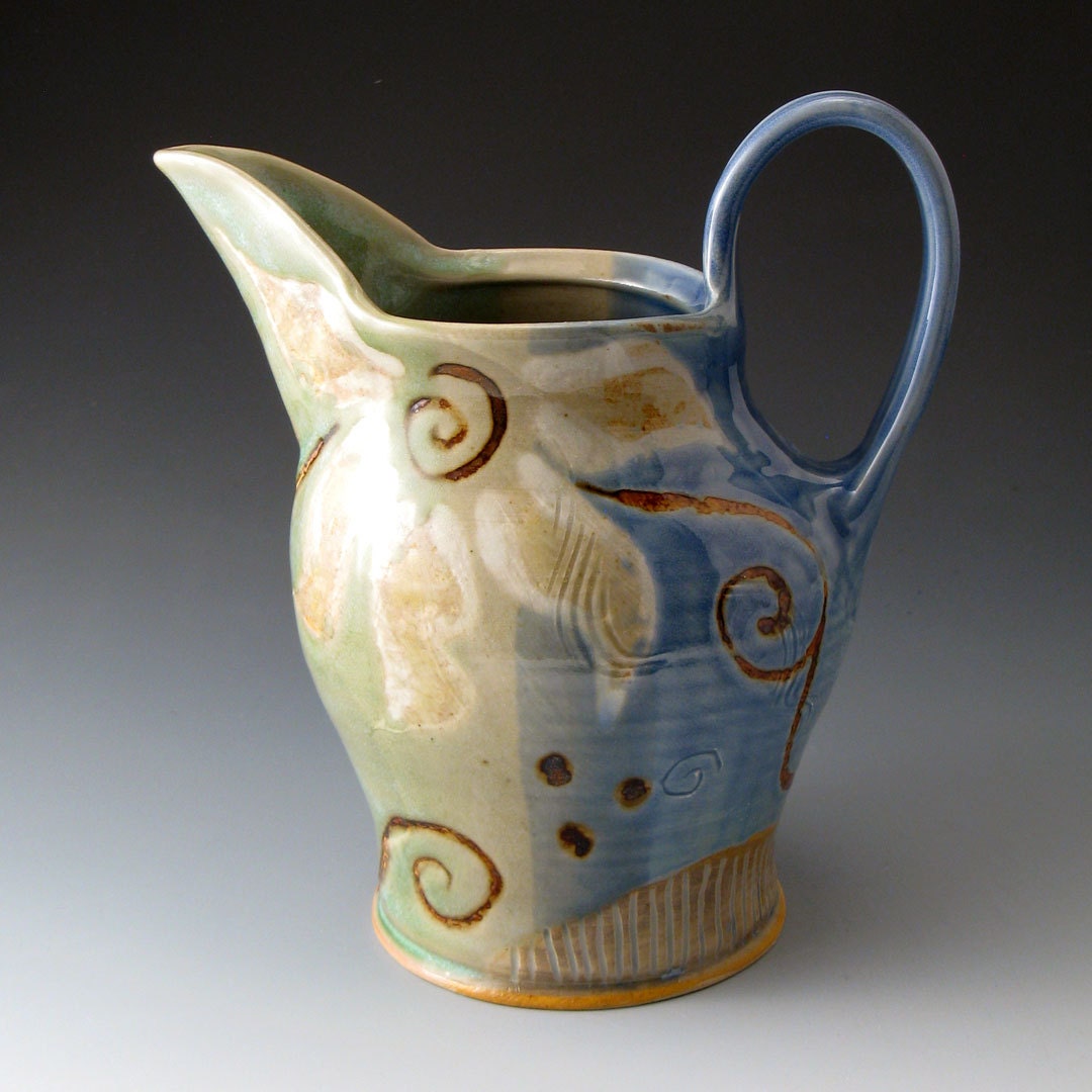 Ceramic Water Pitcher with Flower Motif