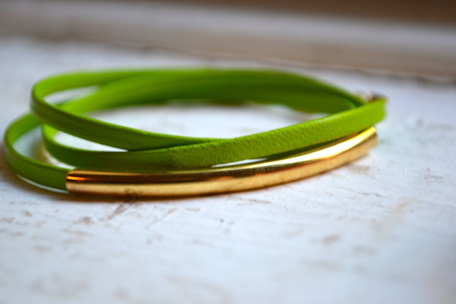lime green skinny leather triple wrap bracelet with long gold tube