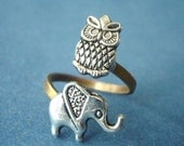 Silver owl ring with an elephant