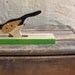 SALE // vintage c. 1960s woodpecker door knocker // painted wood // folk art