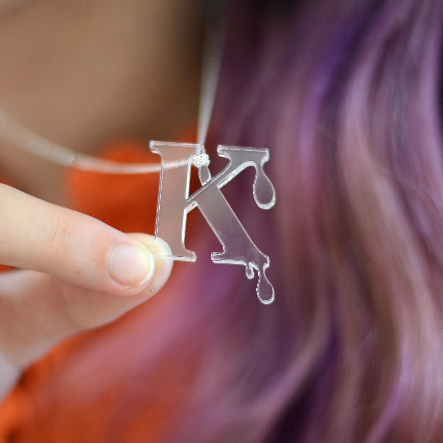 Items similar to Melting Letter K Necklace on Etsy