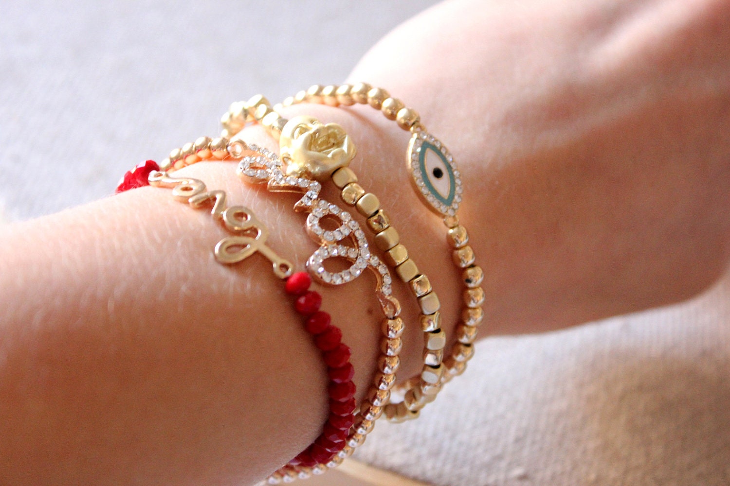 Anthology27, Sweet bracelet with a buddha charm and gold beads