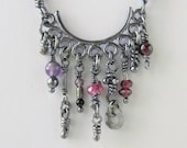 Sterling Silver Necklace. Dangling knots, rings, stones in whimsical pendant -Clan line-