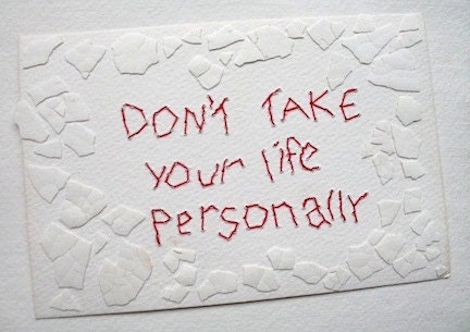 Don't Take Your Life Personally: mixed media w/threaded text message on paper