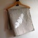 Linen teatowel with feather