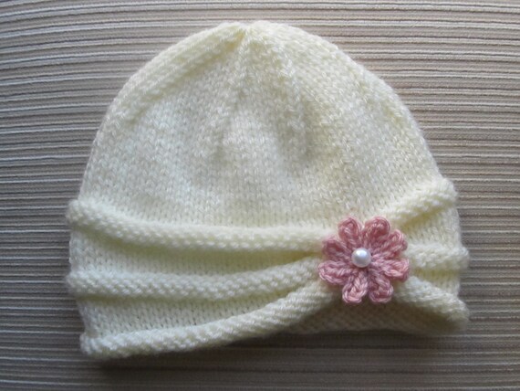 Number 86 PDF Knitting Pattern Girls Hat with Rolled Brim and a Flower in sizes 6-9 months and 2-4 years