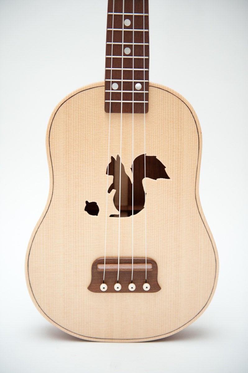 Ukulele (customizable sound hole of choice) Example: Squirrel