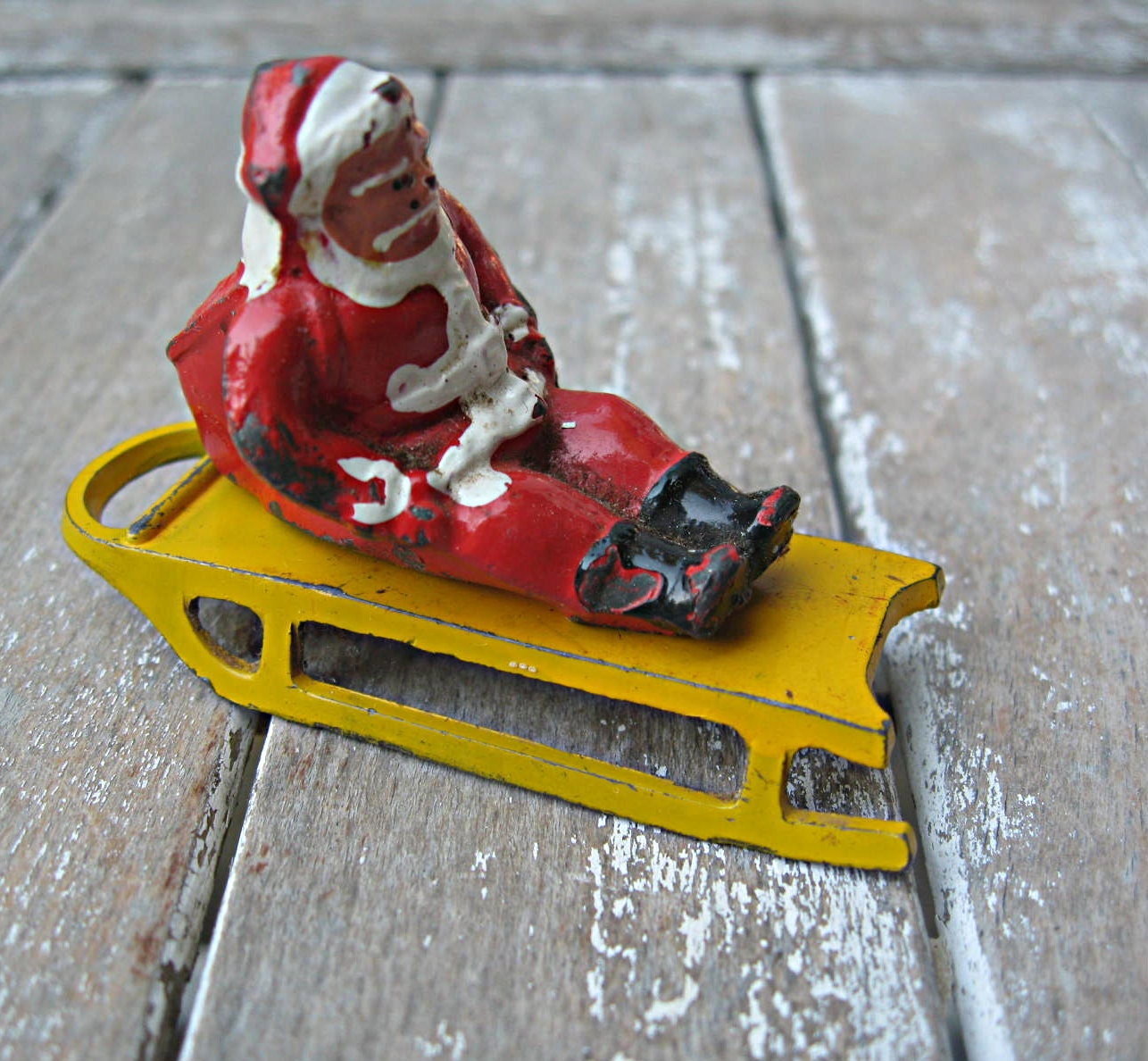 Vintage Santa on sleigh, metal, Christmas decor