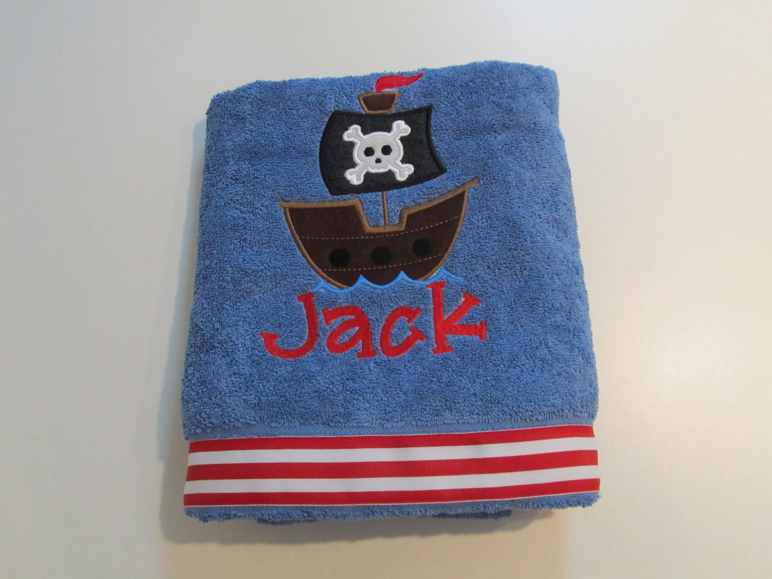 Boys, Bath, Beach, or Pool Towel with Pirate Ship Applique, Monogram, Red and White Stripe Ribbon