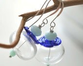 Blue and Clear Modern Flower Earrings, Transparent Hollow Glass Dangle, Lampwork Flower Disc
