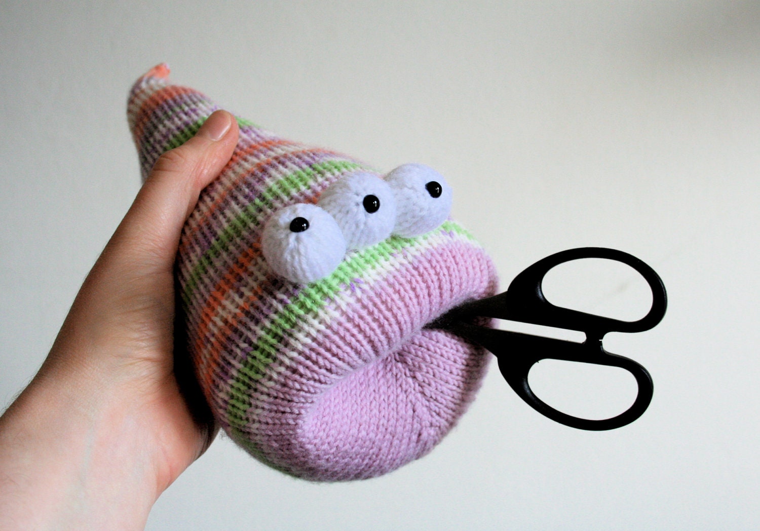 Orange, green and purple Fairisle desk worm