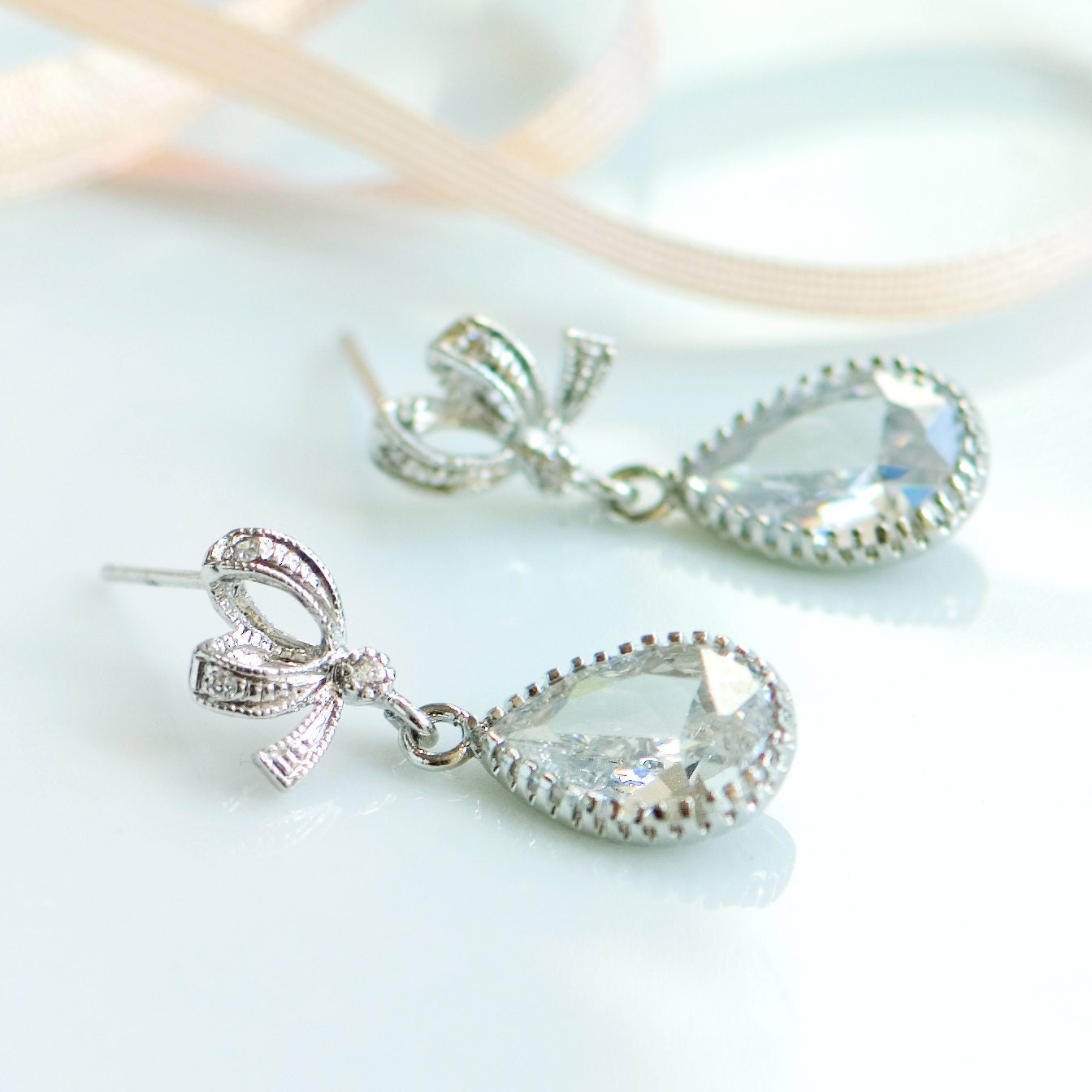 Crystal drop earrings, bridal jewelry, Wedding jewelry, Silver drop earrings, Rhinestone earrings, Clear crystal earrings, Bow stud earrings