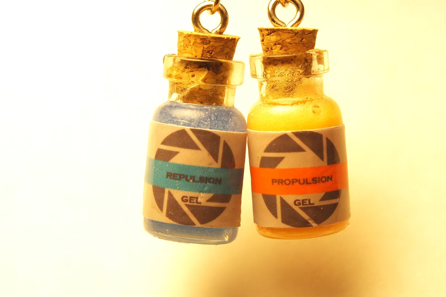 Portal Inspired Glow In The Dark Propulsion and Repulsion Gel Earrings