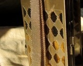 Mad Men Gold evening clutch with mesh handle  surprises hidden inside