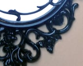 Hollywood Glam . . . Vintage Black SYROCO Mirror with deeply carved arabesques. . . Elegant