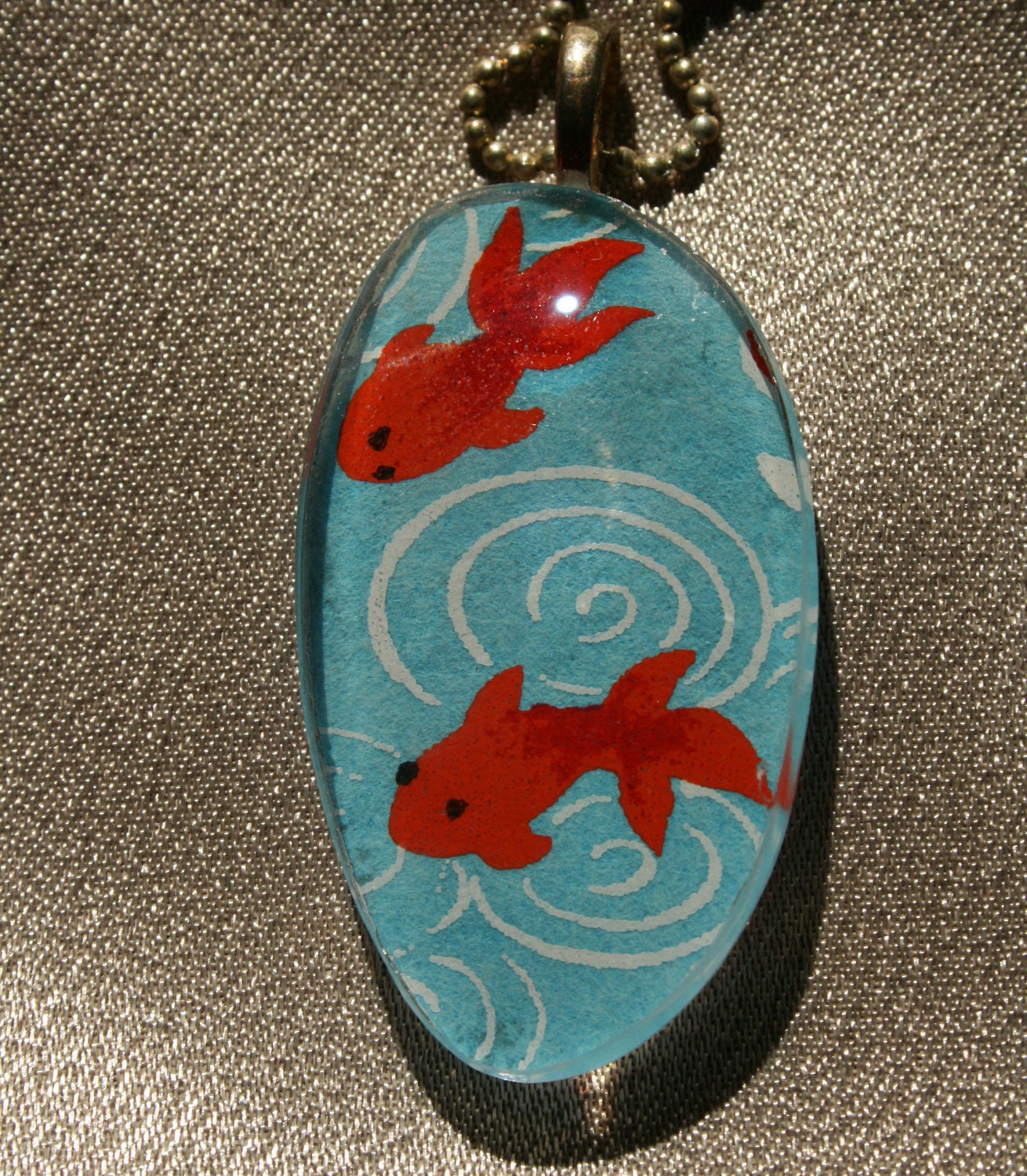 Recycled Eyeglass Lens Pendant (with Chain)--Goldfish on Light Blue Background