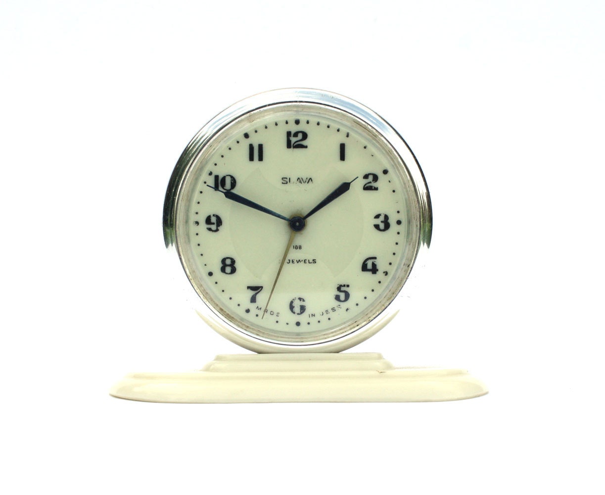 Vintage Russian mechanical alarm clock Slava from Soviet Union period