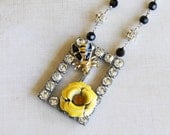 assemblage necklace with vintage rhinestone belt buckle & vintage brooches // eco friendly // busy bee necklace