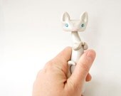 White Cat Sculpture by Bonjour Poupette