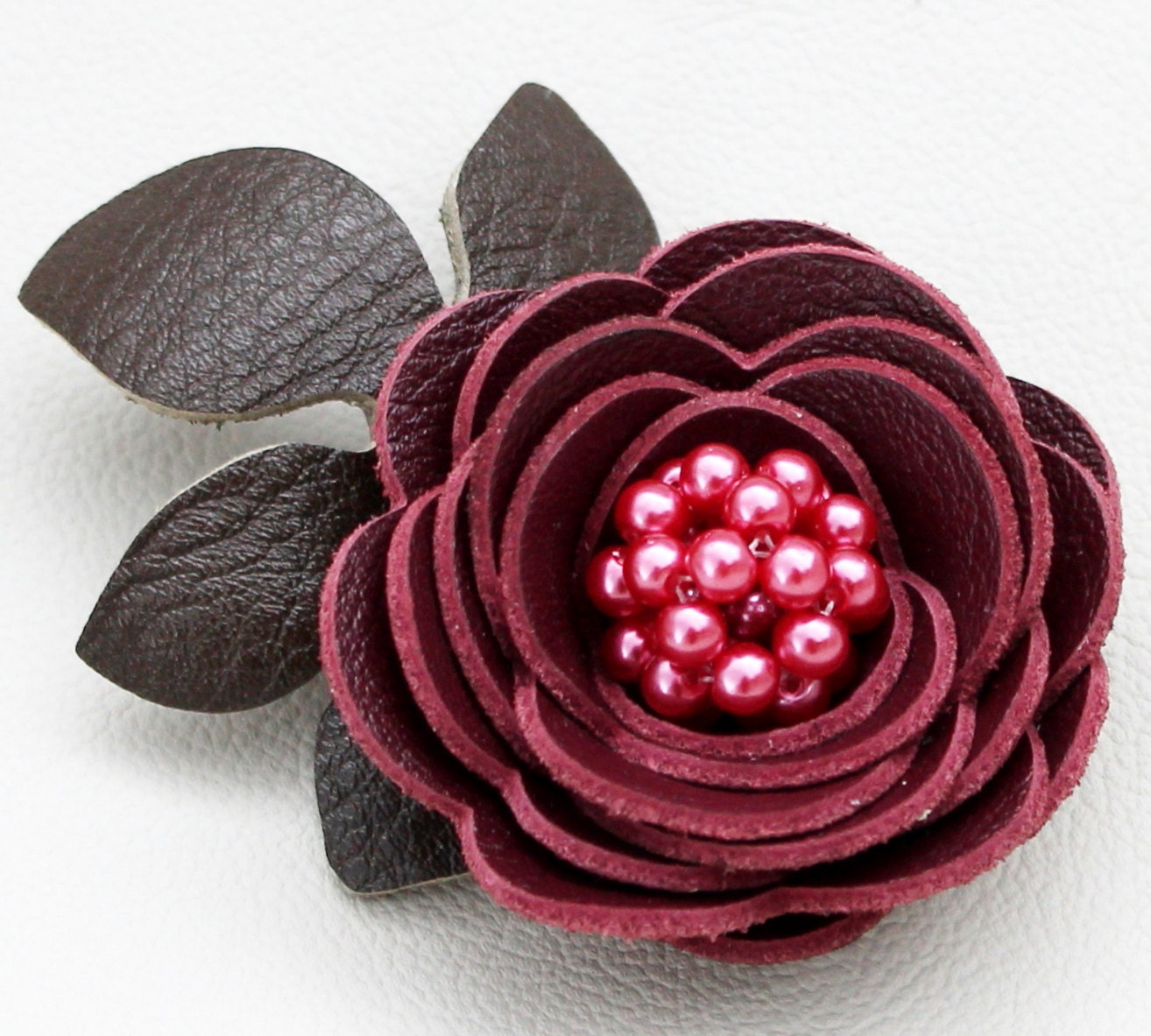 Burgundy flower hair clip fascinator, leather rose, green leaves, beaded center. Woodland wedding 3 year anniversary gift