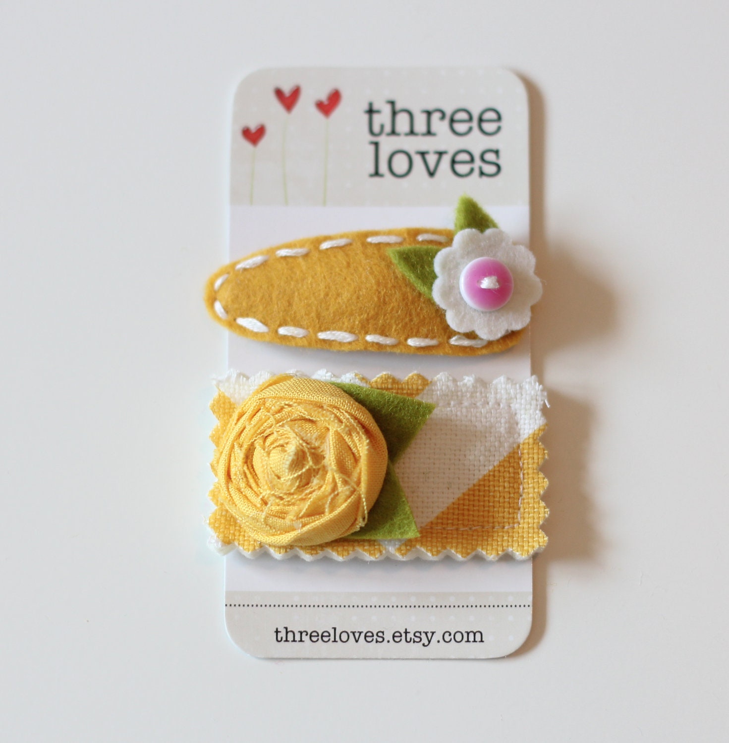 yellow and white chevron snap clips - set of 2