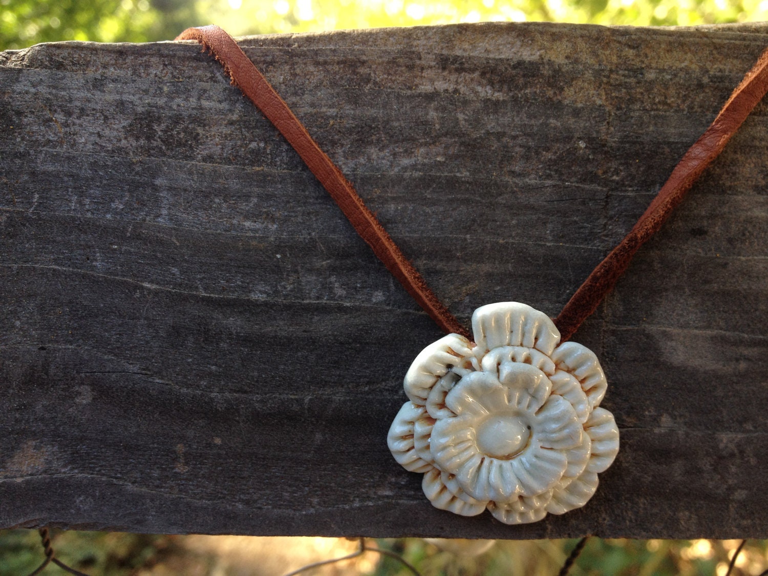 Handmade Clay Blossom Pendant // quality deer hide leather, porcelain and sterling silver