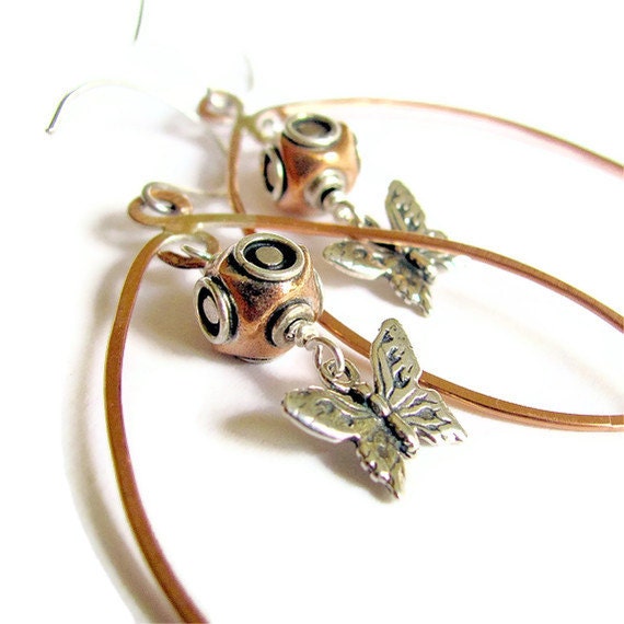 the DIVING BELL and the BUTTERFLY earrings unique jewelry literature jewelry unusual earrings